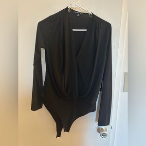 Black long sleeve snap front wrap body suit